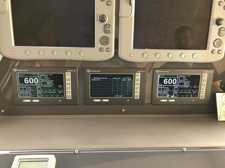 Twin MAN engine monitoring displays at the helm