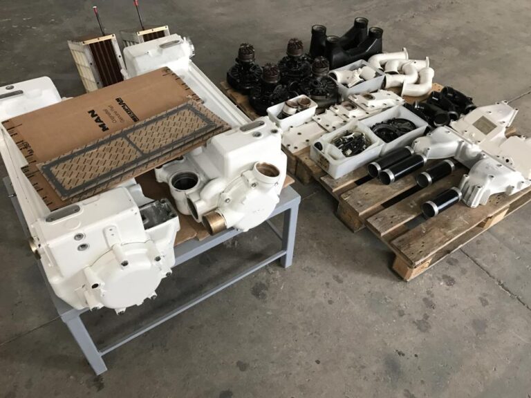 Disassembled MAN engine components arranged for overhaul