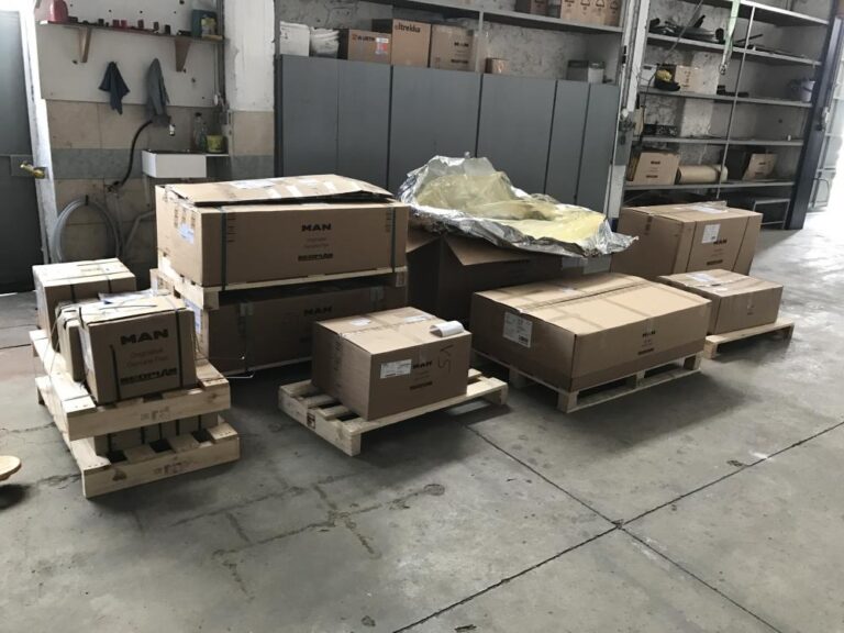 Boxed MAN spare parts in the workshop
