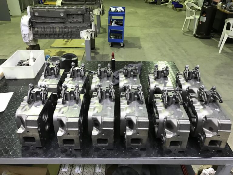 MAN engine internal components arranged on a workbench